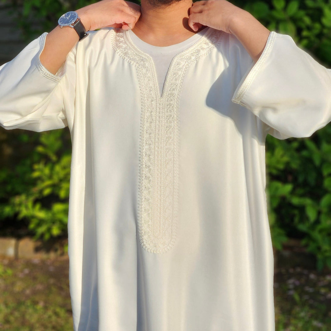 Man wearing white Moroccan gandoura for summer