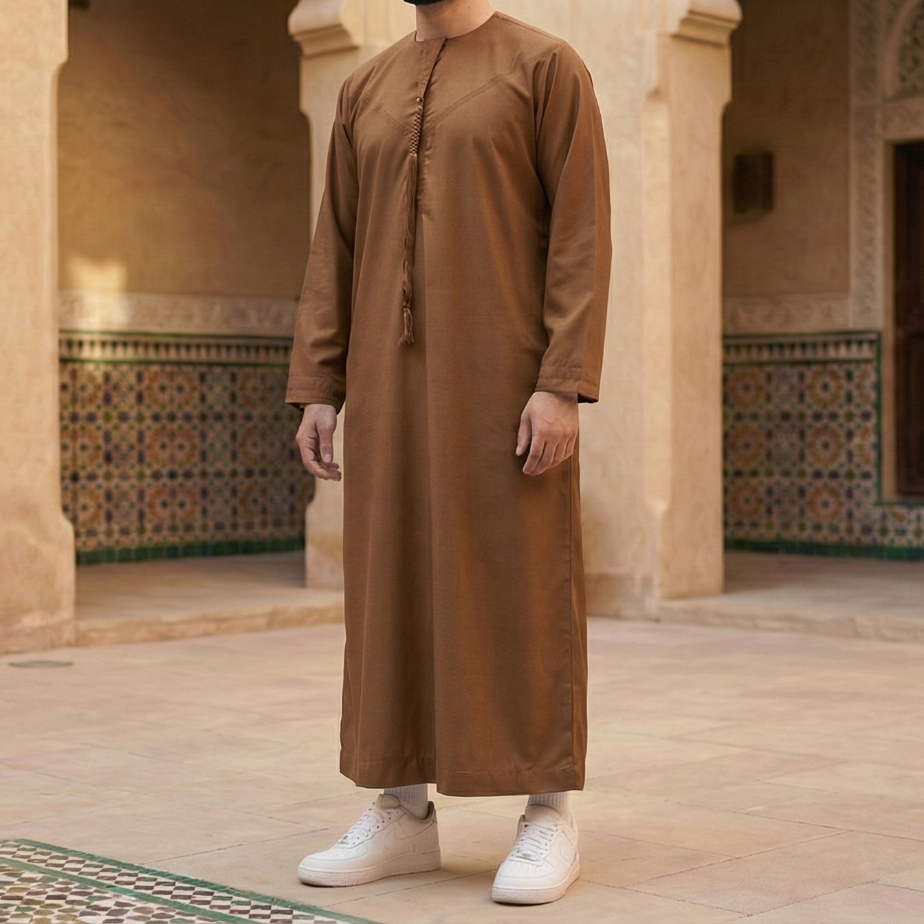 caramel brown Emirati thobe with detachable tassel