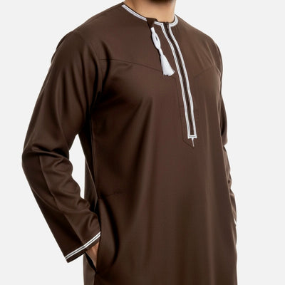 Premium Brown Omani Thobe with with White Embroidery. Featuring a Zip and Removable/Detachable Tassel