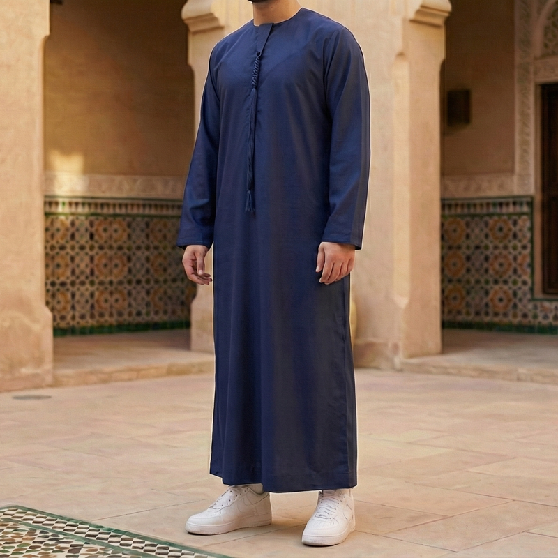 navy blue Emirati thobe with detachable tassel