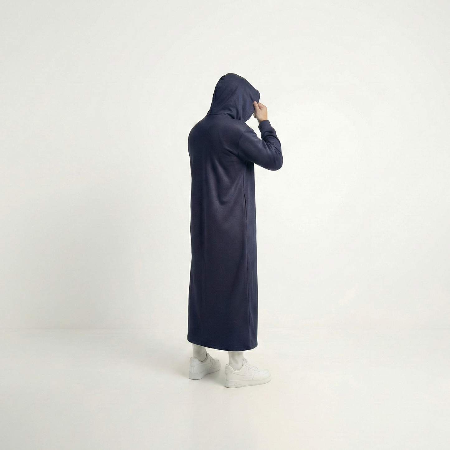 Navy blue hooded thobe with curved hood