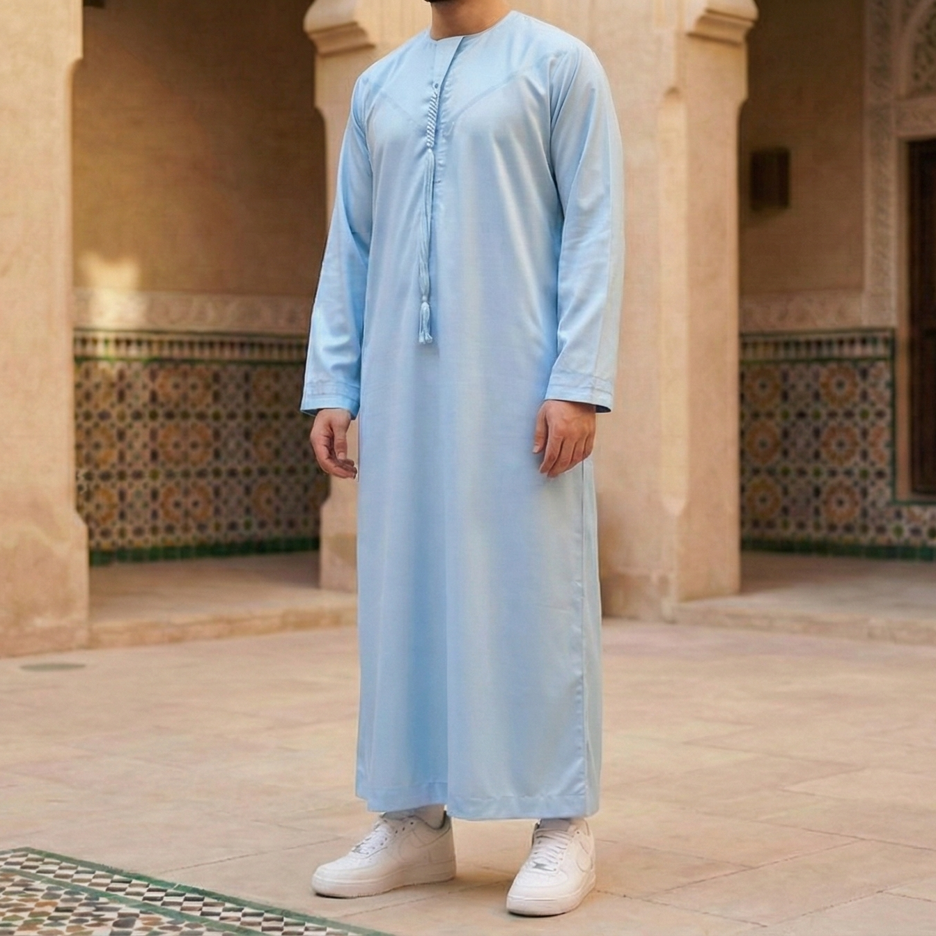 shiny sky blue Emirati thobe with detachable tassel