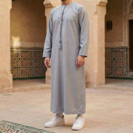 light grey Emirati thobe with detachable tassel