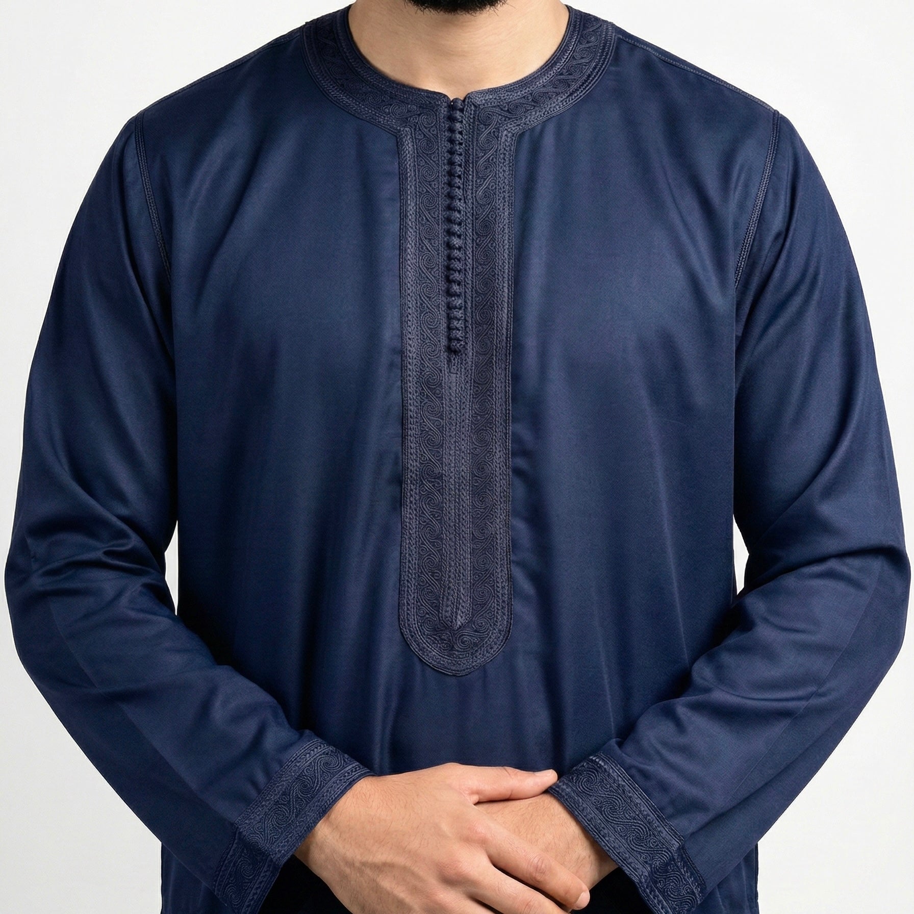 navy blue men's Moroccan kaftan with long sleeves and navy blue embroidery on chest and wrists